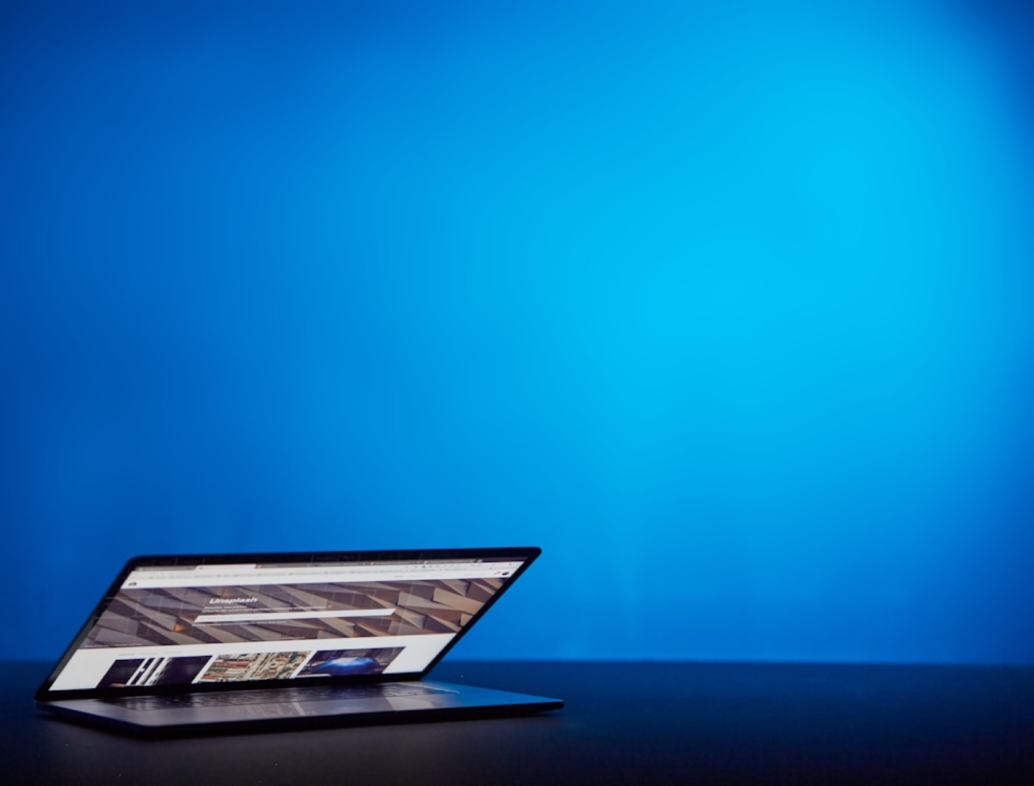 Laptop displaying a modern website